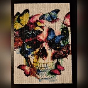 Finished skull with butterfly diamond painting